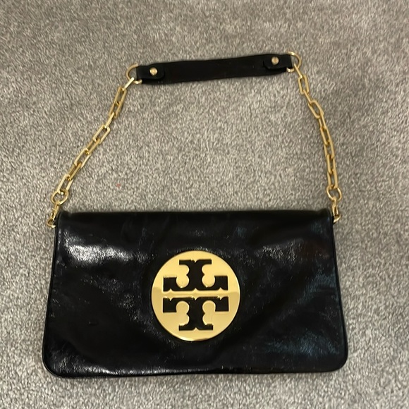 Tory Burch Handbags - Black Logo leather clutch from Tory Burch